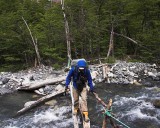crw_3547-ray-4118 Crossing a bridge after leaving the Los Perros campground, where we rediscovered how good hot milo tastes. Taken by Ray Woo.