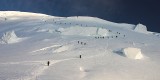 crw_7348 The horde winding their way around seracs and crevasses just past the top of Disappointment Cleaver.