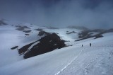crw_7315 Paul and Steph in the miserable weather on the way up to Camp Muir.