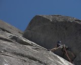 crw_5733 Chris stemming halfway up the 5.8 lieback crack while deciding what piece to put in.