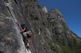 crw_5754 Chris heading up the crack with the granite walls of Yosemite valley in the background.