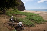 _mg_1250 Serene and Ray fixing their feet on Kalalau beach before we started heading back.
