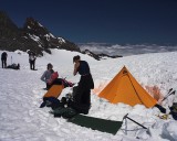 crw_7338 Paul and Steph setting up camp. We used my Golite Hex, which is pitched in the background.