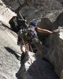crw_5701 Chris leading the first pitch of the Nutcracker (5.8) while Danielle struggles past the tree with the large pack. From what I can tell, getting the pack past the tree was the crux for her.