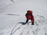 img_0314 Eu-Jin on the second rappel off the summit of Tocllaraju (6032 m). Our ropes (a 60 and 35 m twin) weren't quite long enough so I rappelled off a single wet 7.7 mm which was not fun. Photo by Jared Brown.