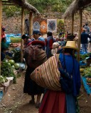 _mg_9280 Quechua ladies carrying their produce in the Chincero market.